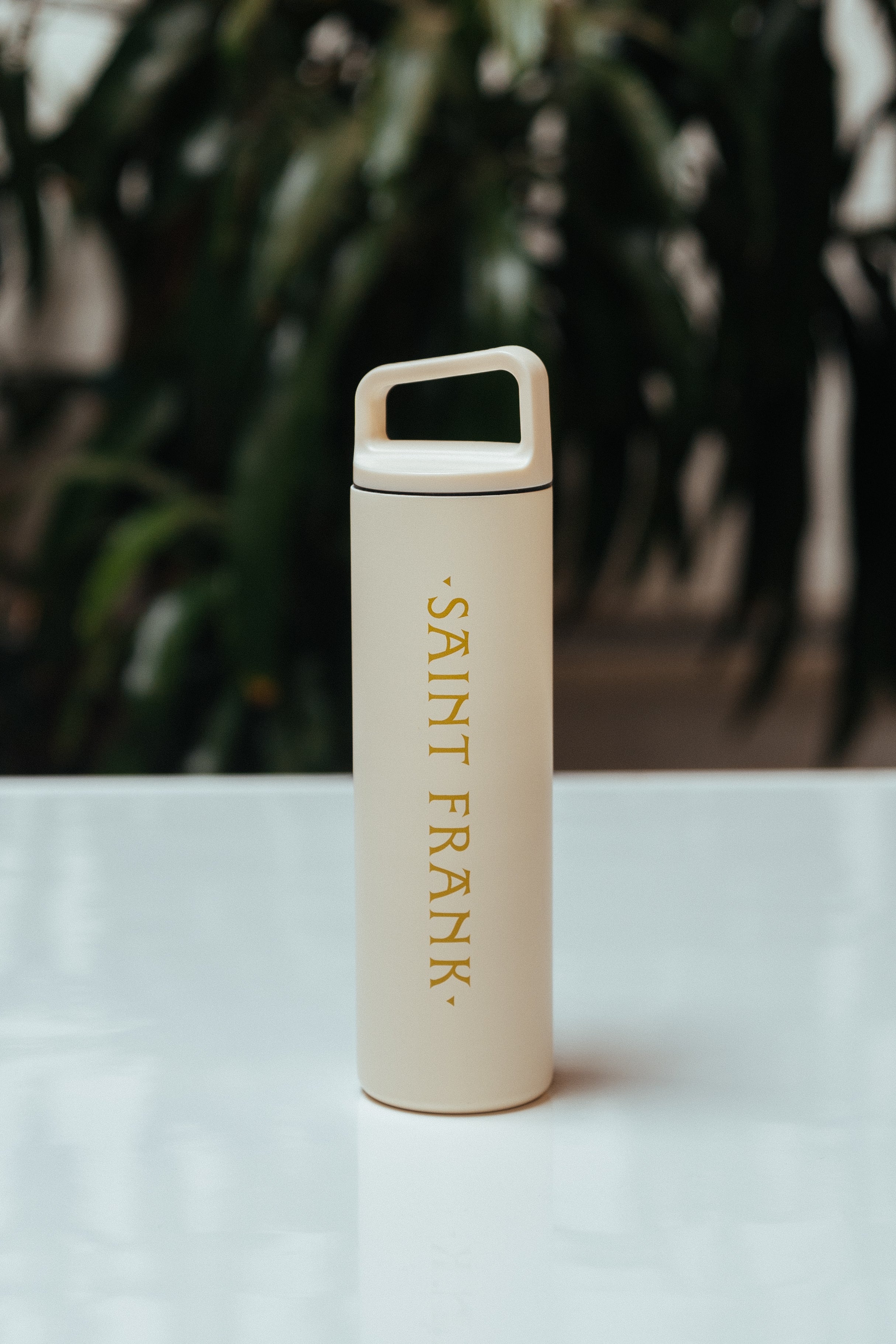 Offwhite Saint Frank MiiR water bottle 20oz with gold saint frank logo printed down the side