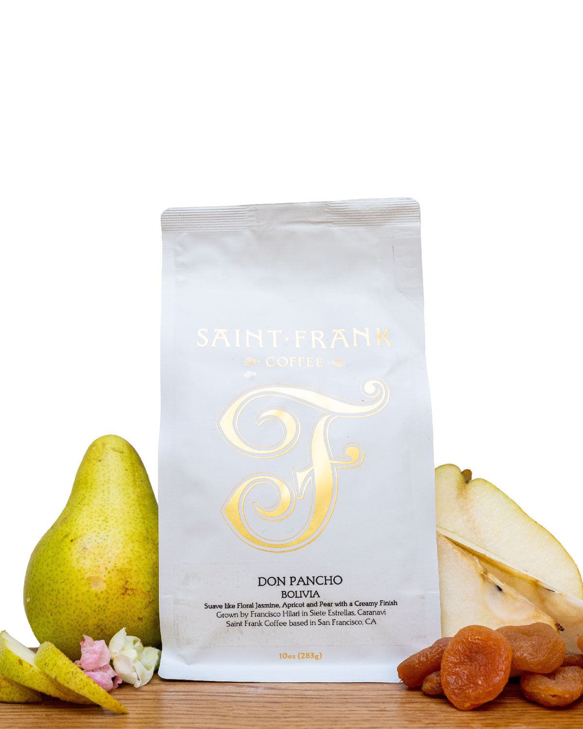 Coffee bag surrounded by Pears, Apricot, and Flowers